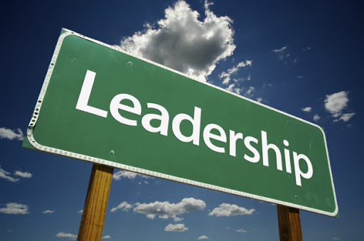 leadership-road-sign-with-dramatic-clouds-and-sky