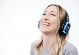 woman in gray shirt smiling