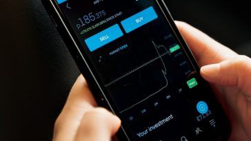 person holding black android smartphone