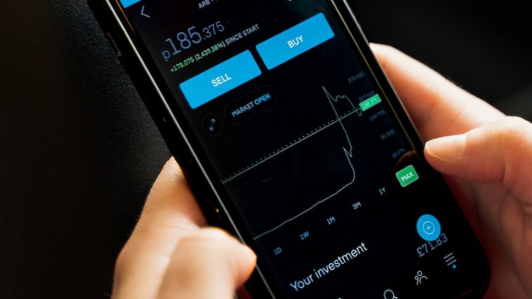 person holding black android smartphone