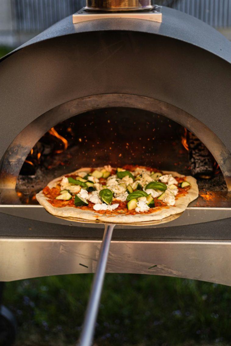 pizza on white ceramic plate