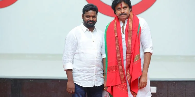 Men in Elegant Clothing Posing Together for a Picture