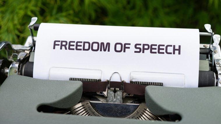 white and black typewriter on green grass