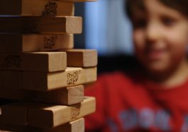 boy in red and black crew neck shirt