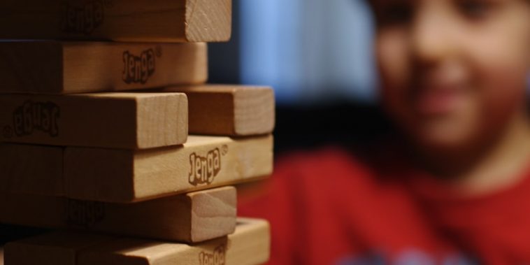 boy in red and black crew neck shirt