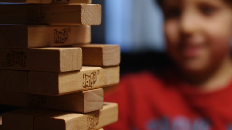 boy in red and black crew neck shirt