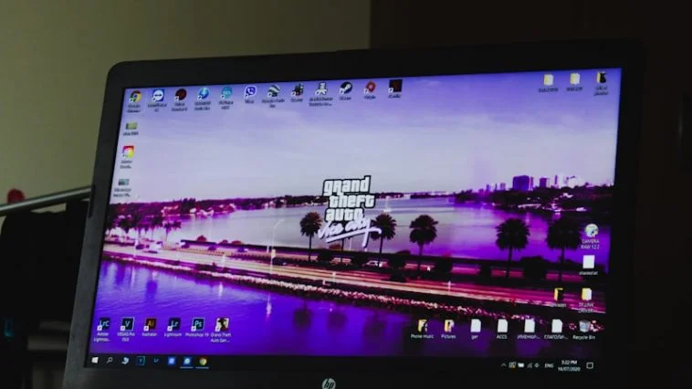 black flat screen computer monitor turned on beside black computer keyboard