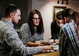 man and woman sitting at the table