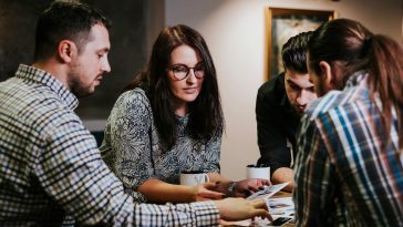 man and woman sitting at the table