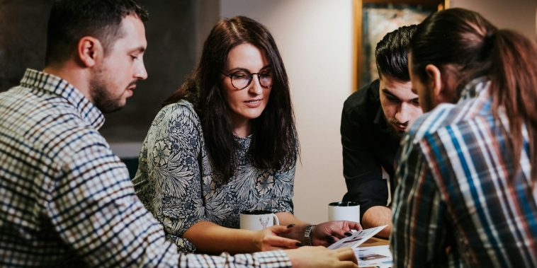 man and woman sitting at the table