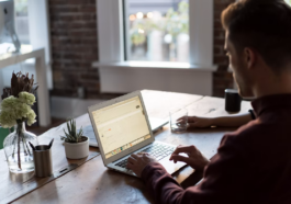 Small business owner working on a laptop at a desk